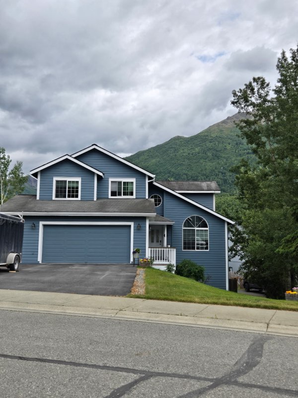 Beautiful blue residential home painted by A & G Painting in Anchorage, Alaska